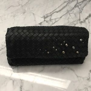 100% authentic Bottega Veneta black clutch design